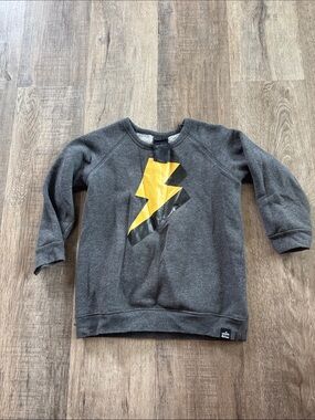 Kids Charcoal Sweatshirt with Yellow Lightning Bolt whistle and flute